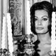 Illustration for article titled Pure Glamour Is Sophia Loren Toasting You From Behind This Terrifying Candelabra